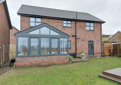 DIY Tiled Roof Grey and Brick Gabled Conservatory