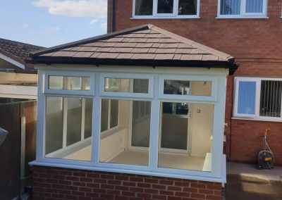 Edwardian Dwarf Wall Conservatory with Brown Tiled Roof