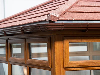 Brown Frame tiled roof conservatory