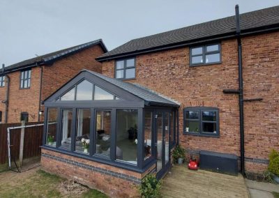 Gable Conservatory with a Dark Grey Frame