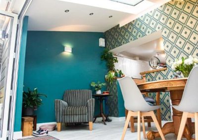 Home Extension with Teal Palette Interior