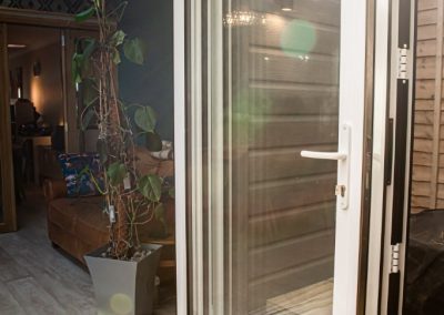 White Bi-fold Door on a Home Extension